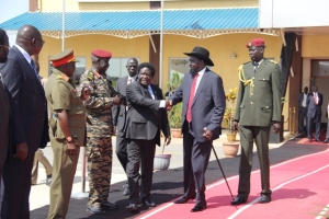 President Kiir shaking hands with D.Governor of Central Equatoria Manassah Lomole